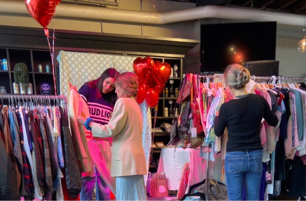 Joyful yoga at an Empowering Wellness workshop for Sustainable Style & Community Wellness in North Vancouver.